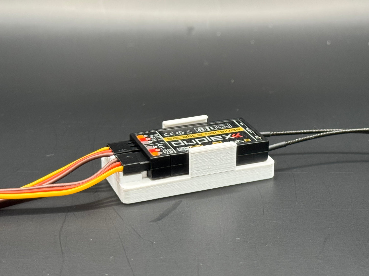 Halterung für JETI RC-Switch und RSat 2